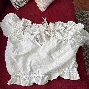 White ruffle crop blouse